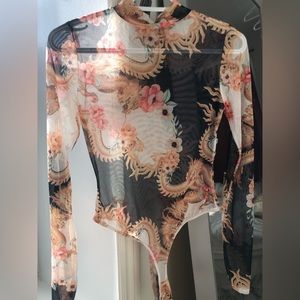 A sheer gold, black & white body suit(thong) from Boohoo!